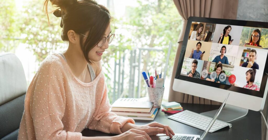 Woman working from home on a video call on computer