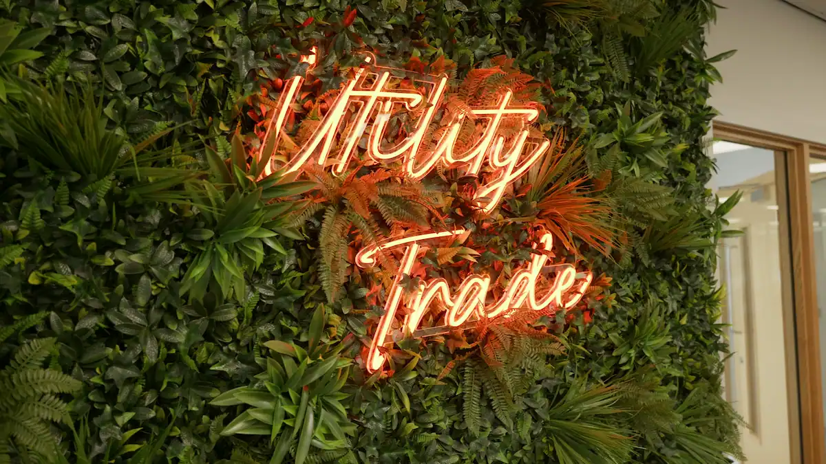 Glowing red sign reading 'Utility Trade'