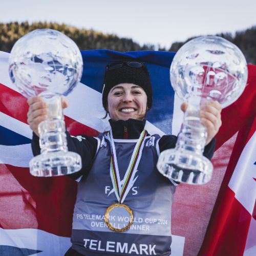 photo of Jasmin Taylor at FIS telemark holding up trophies