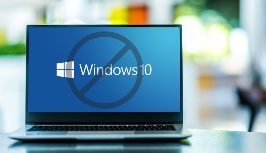 Laptop displaying windows 10 logo with no access sign over top